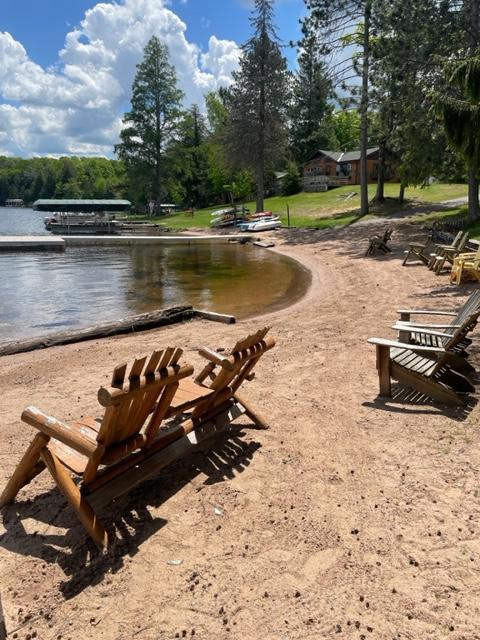 Adirondack chairs on the beach